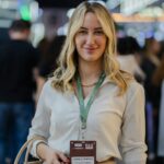 Employee wearing an identification badge for comparing EUID and employee ID